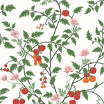 Our Heirloom wallpaper celebrates the annual arrival of tomato season. Highly durable, fade resistant, and made in the USA. This wallpaper features red and orange tomatoes, pink flowers and green vines on a white background and was created in collaboration with The Aesthetics of Joy.
