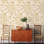 Clouds to Cry (Goldenrod) features hand-drawn animals in a garden scene. Ochre yellow illustration on a white ground.