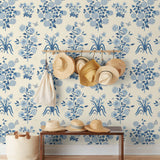 This large-scale wallpaper features hand drawn bees, butterflies and other garden friends frolic among flowers - camellias, hellebores, irises, and snowball trees. Harmony (Porcelain) is printed in shades of blue on a cream background.