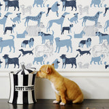 Find your favorite furry friend in our Dog Park pattern, designed in collaboration with Julia Rothman. This wallpaper features blue and navy dogs on a white background.