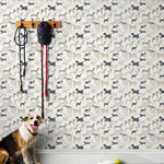Find your favorite furry friend in our Dog Park pattern, designed in collaboration with Julia Rothman. This wallpaper features gray and taupe dogs on a white background.