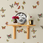Butterflies (Parchment) featuring red, sage and mustard butterflies on a cream background | Nathalie Lete + Hygge & West