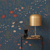 Alpine Garden Multi (Midnight) featuring hand drawn flowers in red, lilac, and pink with metallic copper accents on a deep blue background | Schoolhouse x Hygge & West Wallpaper Collection