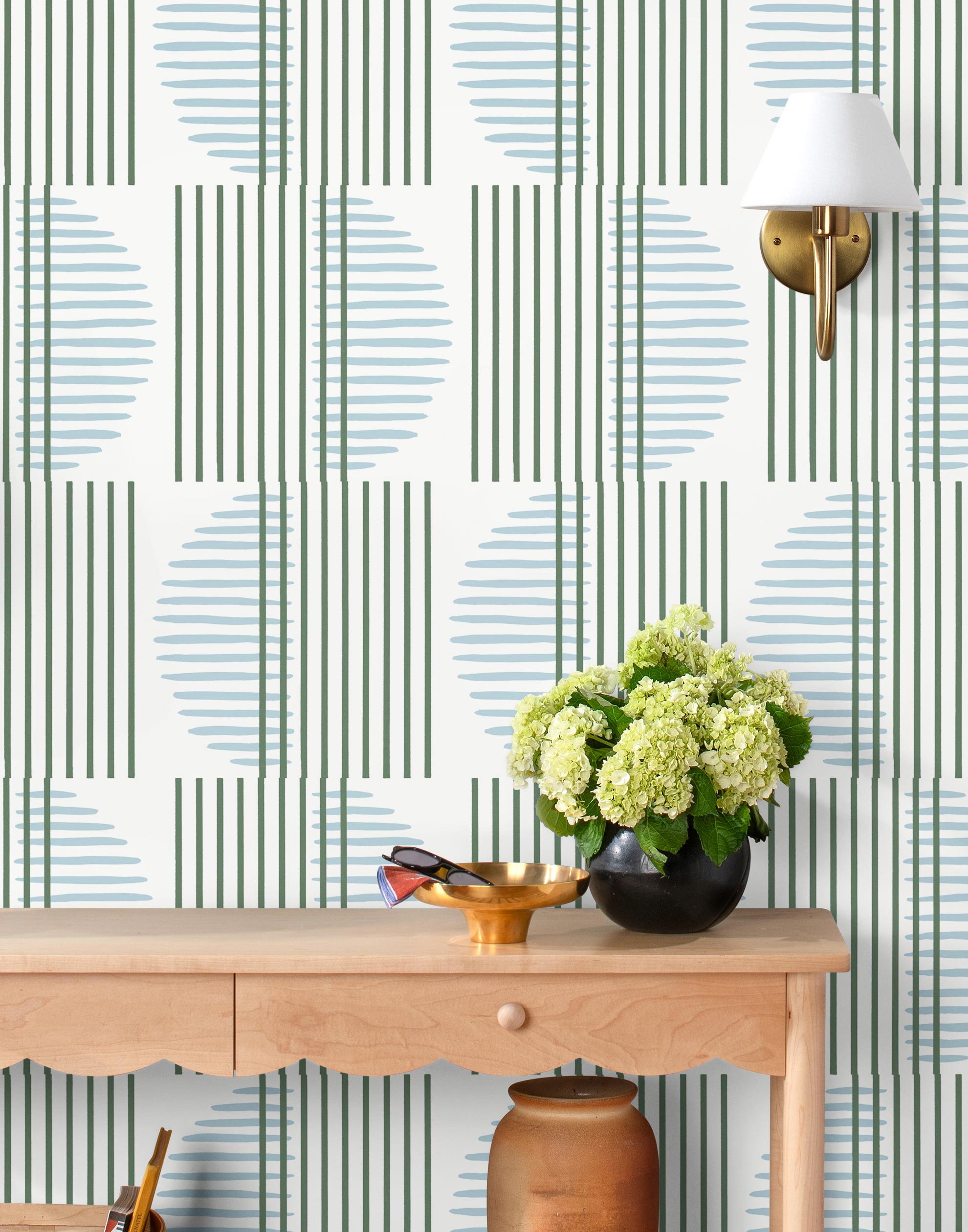 Wallpaper with irregular line work that weaves green rectangles and blue semicircles on a white background | Schoolhouse + Hygge & West
