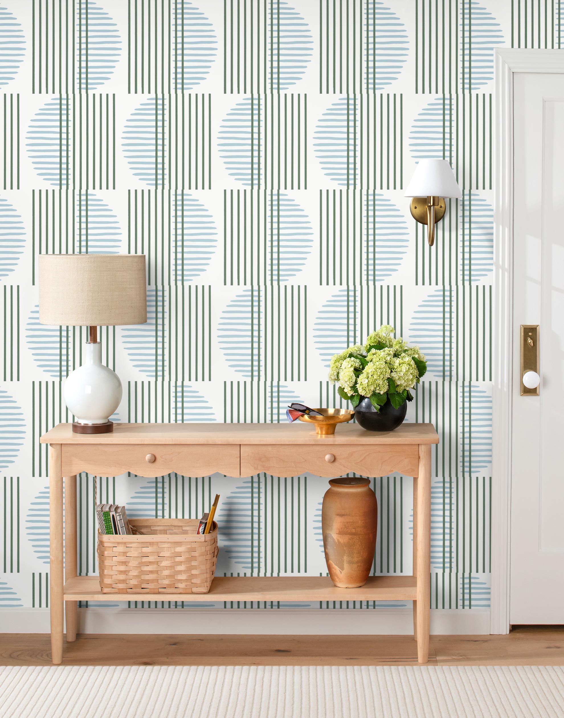 Wallpaper with irregular line work that weaves green rectangles and blue semicircles on a white background | Schoolhouse + Hygge & West