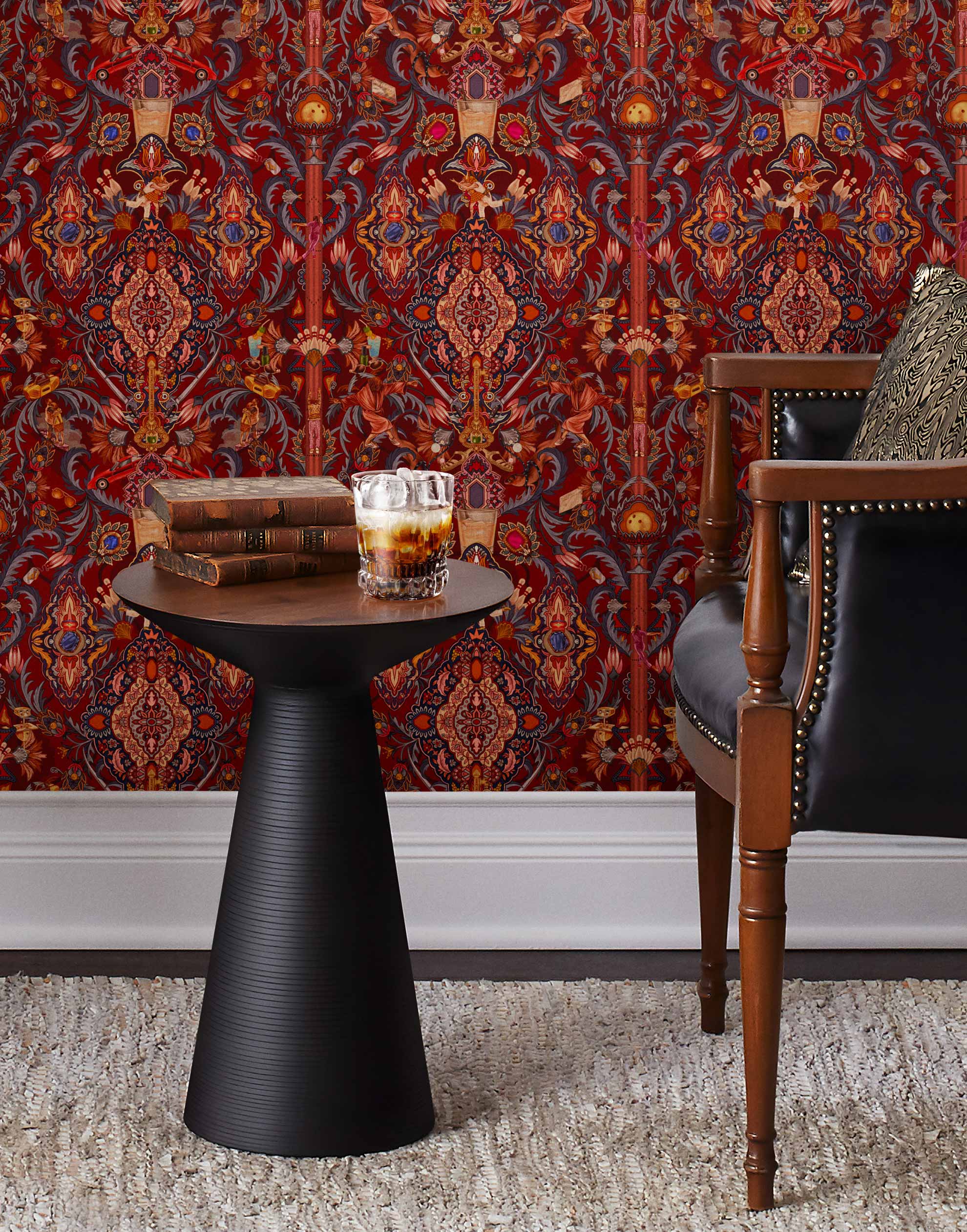 Inspired by The Big Lebowski’s singular characters, "striking" imagery, and oft-quoted dialogue, Abide Wallpaper is a visual feast of iconic movie moments. Red background designed to interpret a rug with hidden characters and scenes form the movie in blue, gray, pink, and orange. Universal + Hygge & West