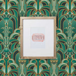 Drawing inspiration from the iconic Emerald City in Wicked, this wallpaper features a mesmerizing blend of deep greens and golds, evoking a sense of magical grandeur. The intricate geometric design mixed with hot air balloons and flying monkeys brings the enchantment of the city into your home.