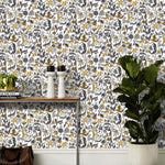 Foret (Charcoal) features magical animals and flowers in silver, tan and gray on white designed by Julia Rothman