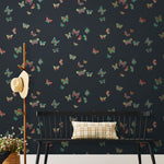 Butterflies (Ebony) featuring red, green and gold butterflies on a black background | Nathalie Lete + Hygge & West