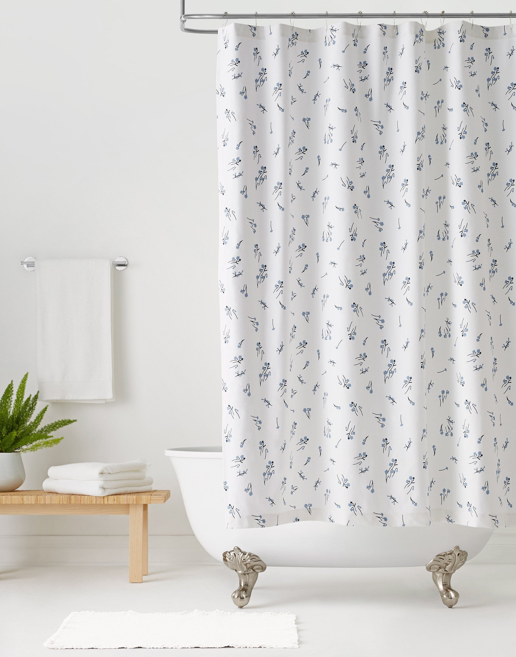 Wildflower White Shower Curtains with blue flowers and navy stems