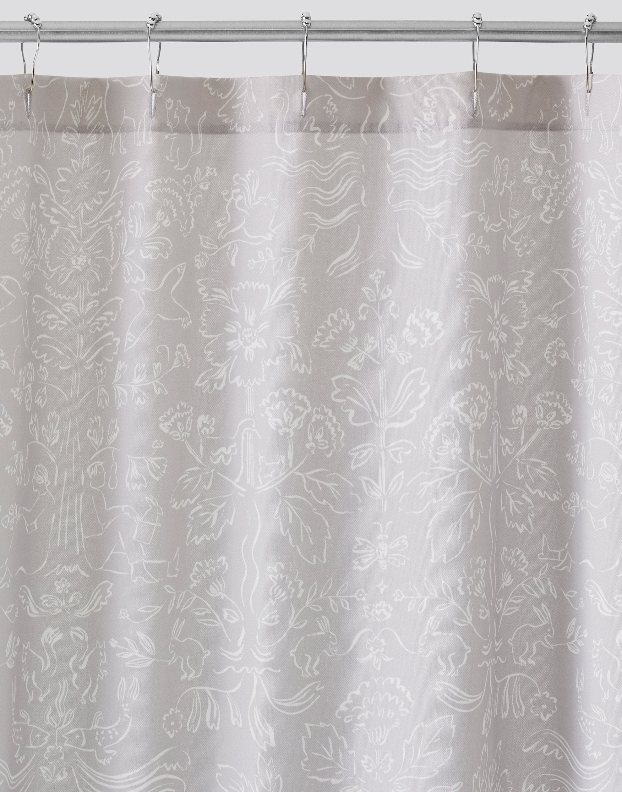 Storyline Gray Shower Curtains featuring white toile-like illustrations on a soft gray background