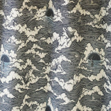 Amity Sunset (Ink) Shower Curtain with dark blue and cream illustrations depicts scenes from the iconic movie Jaws and was created in collaboration with Universal | Hygge & West