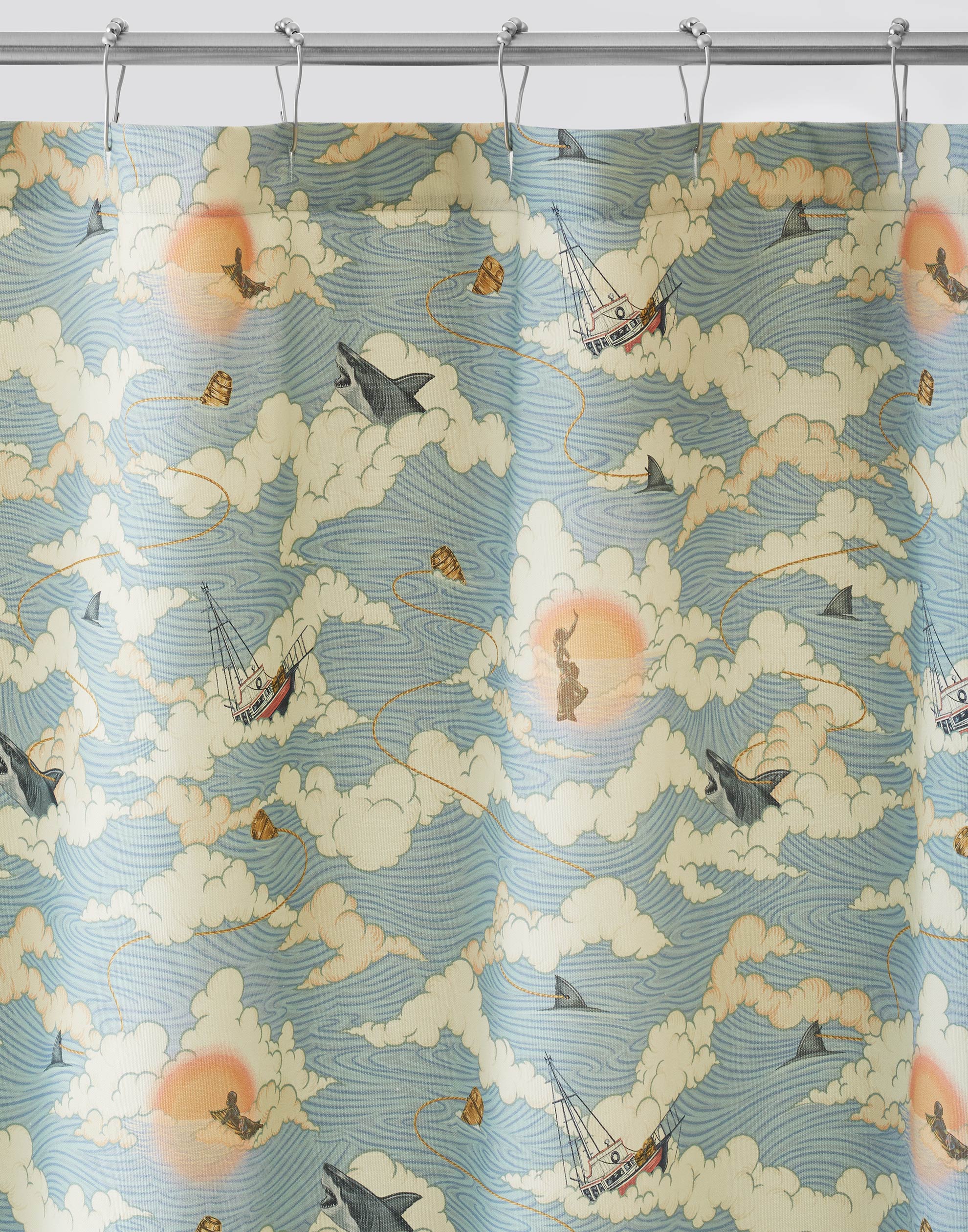 Amity Sunset (Sky) Shower Curtain with dusty blue, orange, and cream illustrations depicts scenes from the iconic movie Jaws and was created in collaboration with Universal | Hygge & West