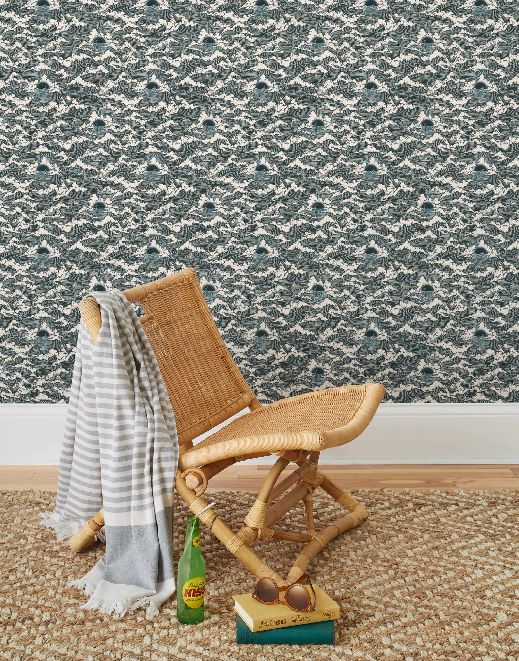 Amity Sunset (Ink) Wallpaper with dark blue and off white illustrations depicts scenes from the iconic movie Jaws and was created in collaboration with Universal | Hygge & West