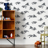 Mighty (Charcoal) wallpaper features gray lions and meerkats on a white background